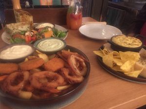 Mix it plate and oven baked cheese with burrito behind at Froindlichst in Berlin