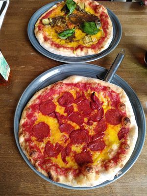 Top to bottom: Courgette/olive pizza, pepperoni pizza at Prezzo in Weymouth