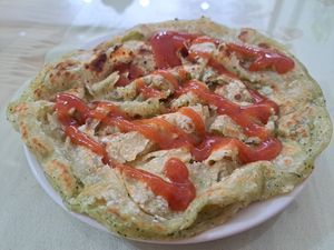 Zhuabing 抓餅 (flaky savoury pancake) at Loving Hut 愛家 in Jian