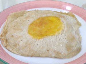 Poached egg at Loving Hut 愛家 in Jian