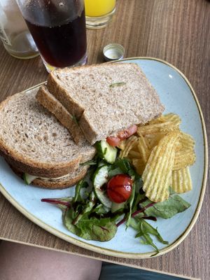 Hummus and salad sandwich with crisps  at The Cove in Robin Hoods Bay