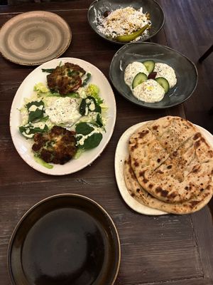 pita bread, couscous, potato puffer and tzatziki   at Apostel's in Munich