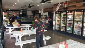 Picnic table seating. And lots of drinks to choose from... at 3rd Street Market & Deli in Los Angeles