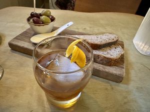 Whiskey cocktail and olives    at Hendersons in Edinburgh