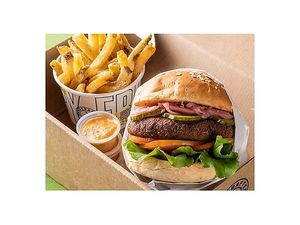 Vurger. Whole wheat bread, chickpea falafel, lettuce, tomato, pickled onions, pickles, caramelized onions, herb sauce. at Hello! in Medellin