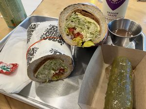 a sandwich and a pickle.  at Rad Magic Subs in Portland