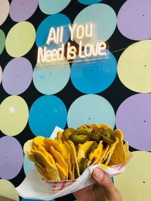Vegan nachos with our homemade plant based nacho cheese at Snack Stop in Pharr