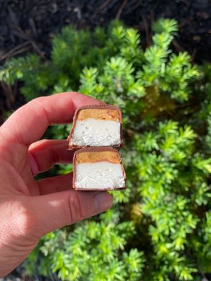 Easy Break!
Soft Nougat, Peanut Butter, dipped in semi sweet chocolate.
 at Sweet Hazel & Co Grab & Go in Salt Lake City