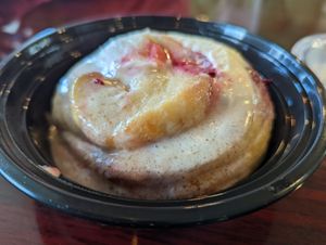 Not your average cinni breakfast, this is the Raspberry Roll! at Sweet Hazel & Co Grab & Go in Salt Lake City