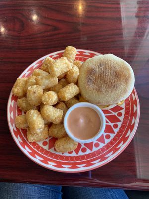 Sausage, Egg, Cheese muffin with a side of Tots!  at Sweet Hazel & Co Grab & Go in Salt Lake City
