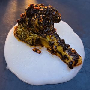 Grilled broccoli and sauce at Hotel Sin Nombre in Oaxaca