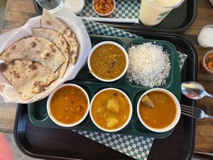 OMG so good. My husband and I both did the 3-curry combo which came with a bread, a rice, and a soup. So many vegan options! They were all delicious. Would definitely come back!  at Tulsi Indian Eatery in Los Angeles
