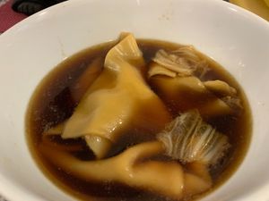 Wonton soup. The broth is more of a cabbage/veggie soup but still good!  at Kuki in Hanover