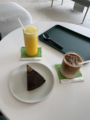 Orange juice, chocolate orange cake and oat latte   at Jisok in Seoul