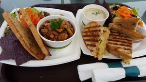 Chili and brown rice, vegan panini, potato coconut chowder, salad. at Cafe Ono in Volcano