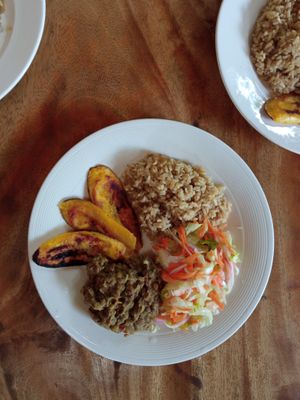 Daily Menu: Cocount Rice with lentils, plantains, and salad  at Gracias Vida in La Guajira