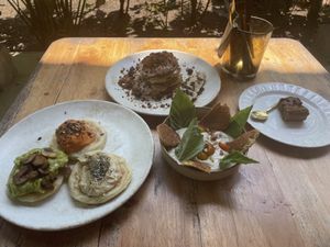 Threesome arepas, coastal caprese, power pancakes, brookie  at Gracias Vida in La Guajira