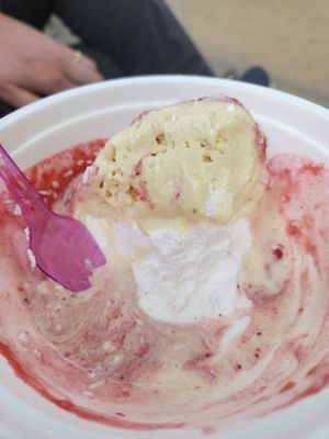 Yummy eis, comes with cream, strawberry sauce and coconut flakes at Eiscafe Olimpio in Frankfurt