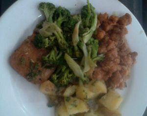 Sweet and sour soy meat bites, brocoli, steamed potatoes and sautee ham at Loving Hut in Panama City