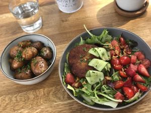 Custom meal consisting falafel patty (from burger), salat and herb roasted potatoes (from sides menu) at NOKK in Tartu