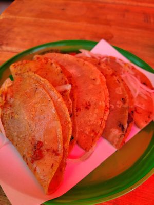 Orden de 5 tacos. (Funky lighting under the umbrella, sorry!) at Los Veganos de Canasta in Mexico City