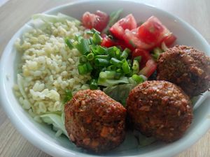 Salad Bowl: bulgur, falafel, green onions, tomato, pesto and lettuce. at Go Vegan Cafe in Batumi
