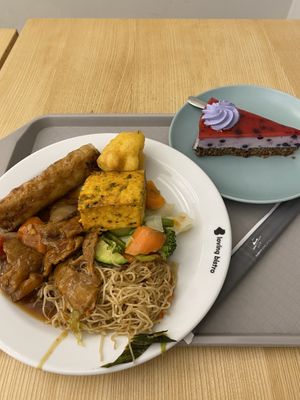 food from buffet and panna cotta cake  at Loving Hut - Vinohrady in Prague