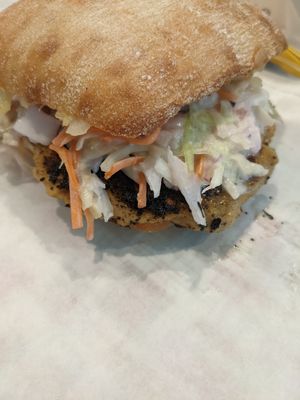Jerk chicken cutlet with pineapple chutney and lime coleslaw! at GRASS fed in Rochester