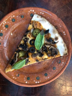 My pizza with mushrooms, olives, jalapeños and basil at Roots in Holbox
