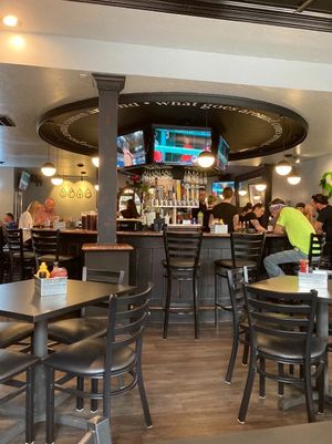 Bar in background  at Sage Karma Kitchen in Willoughby