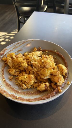Cauliflower with date saucee  at Sage Karma Kitchen in Willoughby