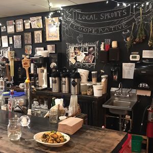 behind the counter  at Local Sprouts Cafe in Portland
