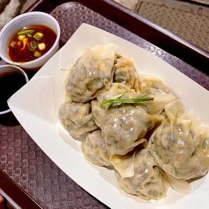 Vegan Wontons - smoked tofu, shiitake mushroom, watercress, pickled veggies, and more   at Dumpling Man in New York City