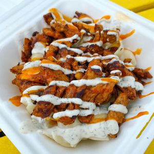 Buffalo Ranch Chick'n Mac Bowl made from house-made cheeze, buffalo, and ranch sauces, gluten-free noodles, and non-gmo bbq soy. at Plantology in Gainesville