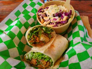 Chick'n Caesar Wrap and coleslaw at Plantology in Gainesville