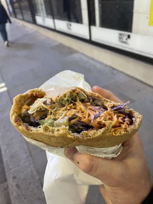 Half eaten falafel   at Falafel + in London