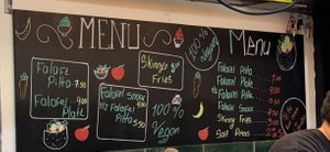 Menu August 2024 100% vegan   at Falafel + in London