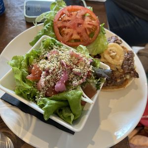 Burger Pura Vida, side seasonal salad no feta  at Tipsy Tails Restaurant in Alma
