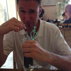 The cereal milk drink is bitter. Served hot.  at May Trang - White Cloud in Hanoi