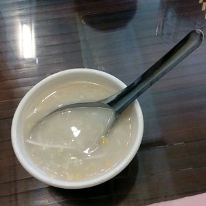Dessert : corn and coconut milk. 15.000 đ. at Truc Lam Trai in Hanoi