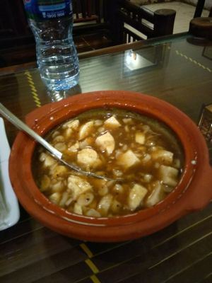 Tofu and mushroom in a pot at Truc Lam Trai in Hanoi