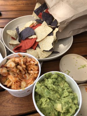 
Guac and chips , pico de gallo, kimchi   at Rock n Roots in Williston Park