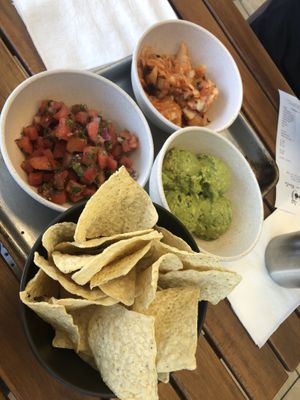 Guac and chips, pico de gallo, kimchi   at Rock n Roots in Williston Park