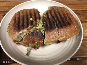 Eggplant panini customize- With just Avocado , Cashew , sauce , eggplant   at Rock n Roots in Williston Park