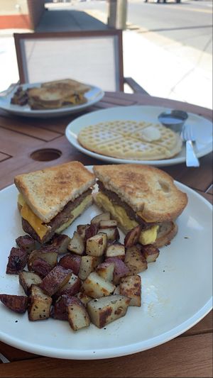 Breakfast sandwich & gluten free waffle  at Earthly Cafe in Somers Point