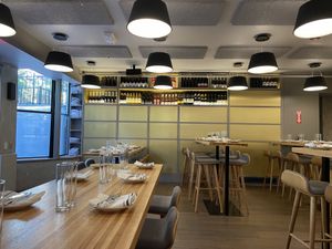 Inside seating is on long communal style tables at Double Zero in Boston