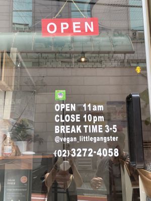 Happy cow sticker on the door!  at Little Gangster - 리틀갱스터 in Seoul