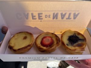 Three vegan natas, plain, strawberry, and blueberry  at Café de Nata in South West London