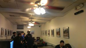 dining area with nice photos on the wall at Blackbird Pizzeria - 6th St in Philadelphia