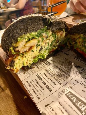 Poppea burger with zucchini falafel, fried onion rings, guacamole sauce, selettive  at Agrippina Street Food in Pula